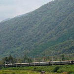Train running at the foot of Mt. Hira